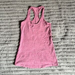 Lululemon tank top in heathered pink, size 6.